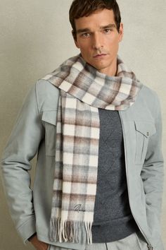 Elevate your wardrobe with versatile scarves that add both warmth and a sophisticated edge to any outfit. Men's Scarves, Checked Scarf