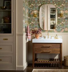 a bathroom sink with a mirror above it