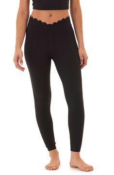 Work out or chill out in these sporty, stretchy leggings sweetened by a scalloped waistband that crosses over for comfort. 24" inseam; 8" leg opening; 8 1/2" front rise; 12" back rise 83% recycled polyester, 17% spandex Machine wash, tumble dry Imported Stretchy Leggings, Jet Black, Work Out, Crossover, Nordstrom, Spandex, Leggings, Black