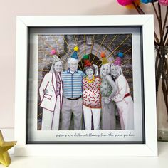 an old photo frame with three people dressed as clowns and one is holding a star