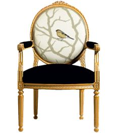 a golden chair with a bird on it's back and black velvet seat, in front of a white background