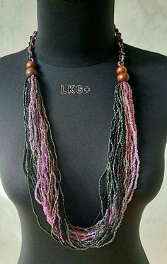 This price ia for 2 pcs Beaded necklace 😍😍 This beaded necklace gives an ethnic, tropical and luxurious feel... beautiful when in daily use, family events, to the office, parties, etc. With a batik blouse.... it will add an ethnic impression 😍 necklace size: Round length necklace= 80 centimeters The following is a link to batik clothes as shown in the picture: -https://www.etsy.com/listing/1022422747/batik-blousesummer-topindonesian-batik -https://www.etsy.com/listing/1033882635/tank-topbatik Black Handwoven Jewelry For The Beach, Black Handwoven Jewelry For Beach, Handwoven Black Jewelry For The Beach, Bohemian Black Handwoven Beaded Necklaces, Handwoven Black Bohemian Beads, Black Bohemian Handwoven Beads, Bohemian Black Handwoven Beads, Bohemian Multi-strand Beaded Necklace With Black Beads, Handmade Multi-strand Beaded Necklace For Festivals