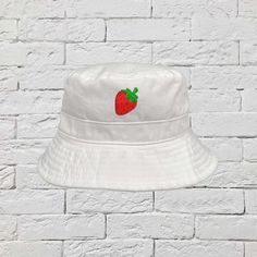 Details What is sweeter than wearing this Strawberry bucket hat! Perfect hat to wear at festivals, for a stroll down the street or a day at the beach. If you are looking for a new hat to add to you collection, this embroidered bucket hat is sure to become one of you favorites. You can wear it for any outdoor activities such as festivals, beach, picnic, walks, camping and much more! Size + Fit - Strawberry embroidered - One size fits most- This snug fitting hat finished with a integrated sweatban Strawberry Bucket Hat, Bucket Hat Summer, Embroidered Bucket Hat, Bucket Hat White, Strawberry Patch, Bucket Cap, White Camo, Embroidered Hat, Hat Summer