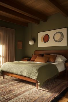 a bedroom with a bed, dresser and rug on the floor in front of a window