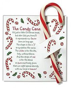 a candy cane is on top of a card