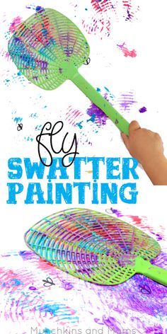 a hand holding a green plastic spatula with paint splattered on it and the words easy swatter painting