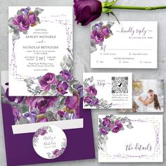 wedding stationery with purple flowers and greenery on the front, two matching envelopes