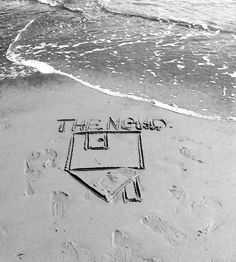 there is a drawing in the sand on the beach