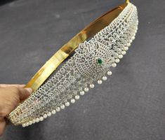 Indian Traditional gold plated waist belt/ Hip belt/ Vaddanam/ Imitation jewelry | Artificial jewelry/South Indian jewelry/gold polished hip belt/ bridal hip belt, Bridal waist belt. Ethnic Fine Quality Designer Wasit/Hip belt. It's suitable for traditional Indian dresses. The Waist belt is adjustable. * Total length of the hip belt (end -to end) is 42 Inches, but suitable for a hip size less than 41 Inches. * Design on the Front portion is 9 inches. Rest is made up of a 1/2 inch wide flat belt. Gold Temple Jewelry Style Bridal Belt For Wedding, Gold Ceremonial Bridal Belt, Elegant Gold Bridal Belt With Tilla Detailing, Elegant Gold Bridal Belt With Tilla, Elegant Gold Bridal Belt For Ceremonial Occasion, Bridal Hip Belt, Kempu Necklace, Wedding Jewelry Indian, Traditional Wedding Jewellery