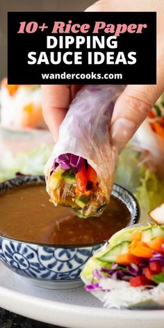 a person dipping sauce into a bowl filled with vegetables and tortilla wrappers