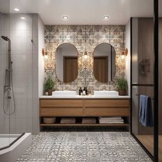 a bathroom with two sinks, mirrors and a bathtub next to a walk in shower