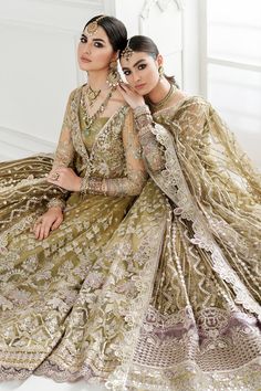 Perfect for wedding or party heavy Designer Heavy Embroidered Anarkali with Jacekt. Olive anarkali with floral motif work, sequins & pearl detail. Comes with sheer panel flared long jacket. The party wear anarkali set and luxurious silk trouser pants will mesmerize and the net embroidered dupatta adds a touch of glamour. Perfect for any special occasion, wedding, or festival! 4 Piece Dress embroidered silk Jacket embroidered net Trouser plain silk Top Length: 56"-58" Bottom Length: 36"-39" Sleev Anarkali With Jacket, Pakistani Cotton Suits, Net Sleeves, Organza Suits, Short Frock, Embroidered Sleeves, Long Frocks, Embroidered Dupatta, Dresses Chiffon