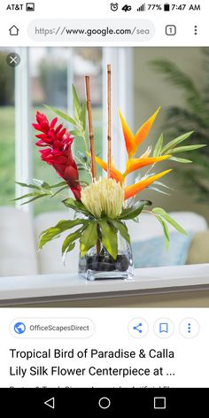 a vase filled with flowers on top of a table