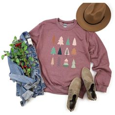 Looking for a cute versatile top to wear this summer? Make sure to grab one of our Cursive Fall Leaf Sweatshirts! This soft and comfortable shirt is the perfect top for any outfit. It can be paired with biker shorts, Jeans, or the classic stay at home sweats! The bright color adds a pop of summer to any outfit. This sweatshirt is true-to-size, so be sure to order your regular size! If you are looking for a more oversized look, make sure to size up. Casual Relaxed Fit Tops For Holiday, Holiday Cotton Tops With Relaxed Fit, Casual Fall Holiday Tops, Casual Cotton Tops For Holiday, Holiday Crew Neck Tops For Fall, Winter Holiday Relaxed Fit Tops, Winter Holiday Tops With Relaxed Fit, Relaxed Fit Winter Holiday Tops, Graphic Print Tops For Fall Holiday Season