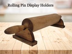 a rolling pin display holder on a wooden table