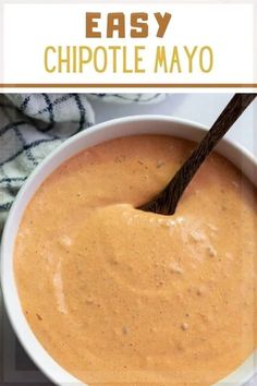 an easy chipotle mayo recipe in a white bowl with a brown wooden spoon