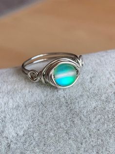 Green Mermaid Glass Wire Wrapped Ring | Etsy Iridescent Glass Round Jewelry, Iridescent Round Glass Jewelry, Handmade Adjustable Iridescent Crystal Ring, Adjustable Iridescent Glass Jewelry, Handmade Iridescent Opal Ring, Iridescent Nickel-free Ring, Wiring Jewelry, Wired Rings, Diy Wire Jewelry Rings