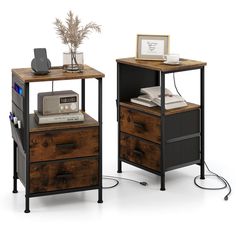 two nightstands with drawers, one has a radio and the other is a telephone