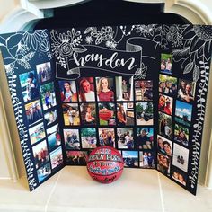 a basketball sits on the floor in front of a display board with photos and words