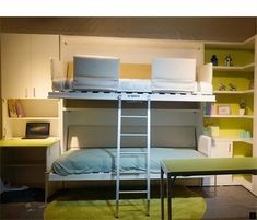 a bunk bed sitting next to a desk in a room