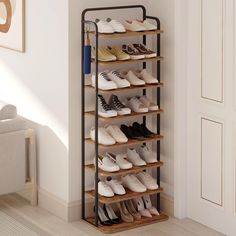 there is a shoe rack with many pairs of shoes on it