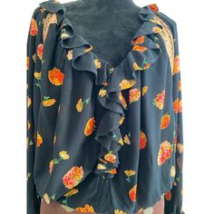 Romantic Black Floral, Blouse, Ruffle Front And Cuffs, Billowy Ballon Long Sleeves ,Peach Lace Inset On V Neck Front And Back And Sides .Pullover Mesh Bottom Snap In Body Suit. Cotton / Poly Blend. Nylon Lace. Machine Wash. Line Dry . Size Small, Cottage Core Vibe. Clean And Ready To Wear.Nwt. Orange V-neck Blouse With Ruffles, Orange Long Sleeve Blouse With Ruffles, Chic Orange Blouse With Ruffles, Chic Orange Ruffled Blouse, Peach Lace, Black Floral Blouse, Small Cottage, Lace Inset, Lace Ruffle