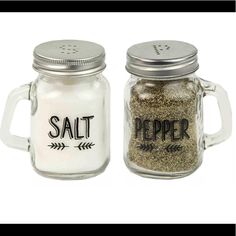 salt and pepper shakers are sitting side by side on a white background the salt is in a glass jar