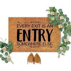 a door mat that says every exit is an entry somewhere else with shoes on it