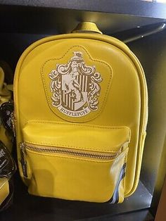 Trendy Fashion Harry Potter The Exhibition NYC HUFFLEPUFF House Crest Logo Mini Backpack Bag, Fashion Bags Hufflepuff House, Crest Logo, Backpack Bag, The Exhibition, Mini Backpack, Bag Fashion, Birthday Ideas, Backpack Bags, Art Ideas