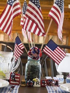 an american flag centerpiece on top of a table