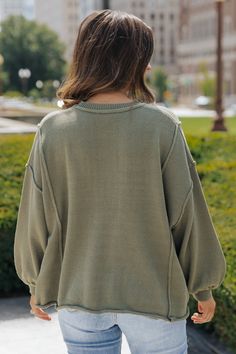 Stay cozy and chic this season wearing this Exposed Seam Pocket Sweater, which is available in TWO colors: Olive & Rust! Crafted from a blend of 60% cotton and 40% acrylic, this sweater features a round neckline, long sleeves with ribbed cuffs, and an oversized fit for comfort. The exposed seam detail and single chest pocket add a touch of style. Pair with jeans, strappy heels, and a chic little clutch for an elevated everyday outfit. Oversized Crew Neck Sweater For Layering, Trendy Oversized Crew Neck Cardigan, Oversized Knit Crew Neck Outerwear, Oversized Crew Sweater For Fall, Spring Soft Knit Long Sleeve Sweatshirt, Oversized Crew Neck Cardigan, Cozy Cotton Crew Neck Cardigan, Long Sleeve Sweater For Spring Layering, Spring Long Sleeve Sweater For Layering