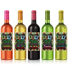 three bottles of wine with colorful labels on them