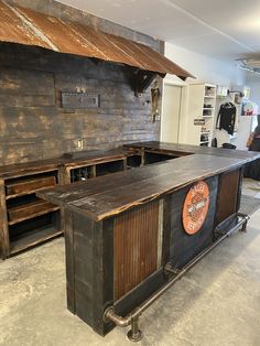 an old fashioned kitchen island made out of wood