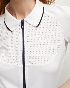 A classic polo, with a high-performance edge. Featuring curved seams, 4-way stretch piqué and breathable mesh at the yoke, this quarter-zip top offers superior flexibility and comfort. Style with a miniskirt and sneakers for everyday chic.Part of our tennis capsule in collaboration with activewear brand L’Etoile Sport.100% PolyamideMesh: 73% Nylon, 27% ElastaneMachine wash coldStyle #T070 Plus And Minus, Everyday Chic, Activewear Brands, Veronica Beard, Comfort Style, Zip Top, Quarter Zip, High Performance, Tennis