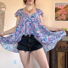 Brand New. Boho Tunic Short Sleeve Top. Flowy Material. Retro, Festival, Hippie, Boho, Upcycle, Vintage, Cottagecore, Urban Outfitters, American Eagle, Free People, Earthbound Trading Co, Wild Fable, Zara, Anthropologie, Altard State, Y2k, Woodstock, Kathmandu, Modcloth, Pretty Little Thing, Fairy, Witchy, H&M, Forever 21, Aerie, American Vintage, Universal Thread, Old Navy, Boutique Lavender V-neck Top For Vacation, Purple V-neck Beach Top, Floral Print Lavender Top For Vacation, Lavender Floral Print Top For Vacation, Casual Purple Top With Paisley Print, Casual Purple Paisley Print Top, Beach Purple Printed Blouse, Purple Summer Blouse For The Beach, Purple Summer Beach Blouse