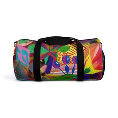 a multicolored duffel bag with black handles and straps on the bottom, featuring an abstract painting