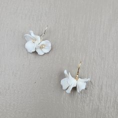 Earring Hand made Length 3cm Clay Porcelain Flower Dispatches from a small business in Canada Delicate Adjustable Wedding Earrings, Delicate Adjustable Earrings For Wedding, Formal White Flower Earrings, Flower-shaped Earrings For Wedding Gift, White Petal-shaped Earrings For Wedding, White Petal Earrings For Wedding, White Flower Earrings For Anniversary, White Petal-shaped Wedding Earrings, White Handmade Flower Earrings