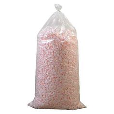 a large bag filled with pink and white candy