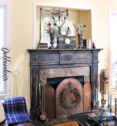 a living room filled with furniture and a fire place