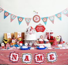 a table topped with lots of cakes and desserts