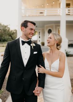 groom in black tux and bride in sleek white wedding dress at The Grand Lady Bride And Groom Tuxedo, Black Tux For Wedding, Groom Black Tuxedo Wedding, Groom Looks Classy, Garden Party Groom Suit, Classic Black Tux Wedding, Black Tie Bride And Groom, Classic Bride And Groom, Timeless Groom Attire