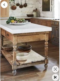 a kitchen island with two bowls on it