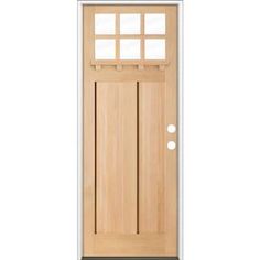 a wooden door with glass panels on the top and bottom panel, in front of a white background