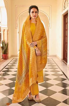 Festive Long Sleeve Jacquard Lawn Suit, Brocade Anarkali Salwar Kameez With Chikankari Embroidery, Long Sleeve Brocade Salwar Kameez With Dupatta, Festive Yellow Jamawar Unstitched Suit, Festive Self Design Jacquard Dupatta, Unstitched Jacquard Sets For Festive Occasions, Yellow Jamawar Sets With Zari Work, Semi-stitched Yellow Salwar Kameez In Jamawar, Semi-stitched Yellow Jamawar Salwar Kameez