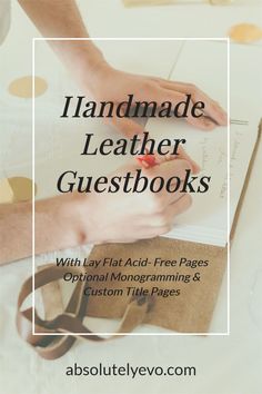 a person writing on a piece of paper with the title handmade leather guestbooks