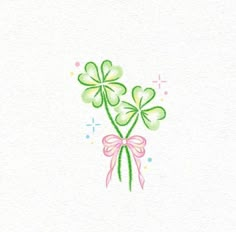 four leaf clovers with pink ribbon and bow