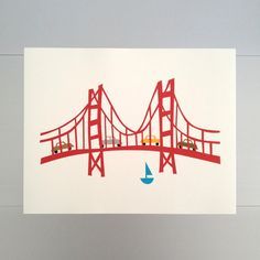 a card with cars driving over the golden gate bridge