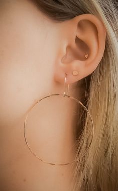 "This item is made to order and will ship after 7-10 business days. That time does not include holidays, weekends or shipping time! Handmade to order in Portland, Oregon. These beautiful hammered hoop earrings are incredibly cute. Each hoop is formed into a circle and soldered for durability. I then hammer out each circular hoop which creates a unique, reflective texture. These earrings catch light well and are incredibly lightweight. These earrings are hand-crafted out of 14kt Gold-fill. Choose Minimalist Rose Gold Dangle Hoop Earrings, Hammered 14k Gold-filled Rose Gold Earrings, Dainty Hammered Round Hoop Earrings, Hammered Rose Gold Earrings 14k Gold Filled, Rose Gold Hammered 14k Gold-filled Earrings, Everyday Hammered Rose Gold Earrings, Everyday Rose Gold Hammered Earrings, Rose Gold Hammered Small Hoop Earrings, Hammered Rose Gold Hoop Earrings Gift