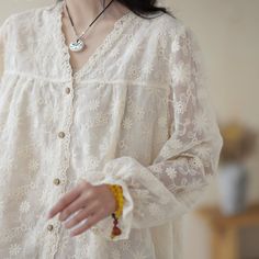 Details: Gender: Women Item Type: Blouse Material: Cotton Season: Spring, Autumn Pattern: Embroidery Style: Casual, Loose, Retro Waist Type: Elastic Waist Size: One Size Length: 61.00 cm/ 24.02 " Bust: 118.00 cm/ 46.46 " Shoulder: 40.00 cm/ 15.75 " Sleeve: 59.00 cm/ 23.23 " V-neck Lace Blouse With Floral Embroidery, Lace V-neck Blouse With Floral Embroidery, Beige Long Sleeve Blouse With Chikankari Embroidery, Long Sleeve Lace Top With Embroidery, Long Sleeve Embroidered Lace Top, Beige Lace Blouse With Floral Embroidery, Summer Embroidery, Autumn Pattern, Spring Fabric