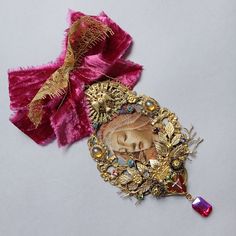 Gorgeous one of a kind baroque brooch in Orthodoxe icon's style. The picture  with Botticelli's Madonna was treated me to look like an old crackle painting. Made with brass findings, vintage glass cabs & gold microballs' dust. The gorgeous pink & blue swarovski crystal is just mind-blooming. The brooch is adorned with a vintage velvet ribbon and a modern  gold french lace. Unique & Exuberant. Could be worn on jacket & dress as well as on coat & fur Shabby Chic Earrings, Baroque Jewelry, Wedding Brooches, Vintage Assemblage Jewelry, Found Object Jewelry, Crackle Painting, Fabric Brooch, Wedding Brooch, Assemblage Jewelry